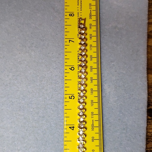 Cubic Zirconia Goldtone S Curve Bracelet - Picture 3 of 3